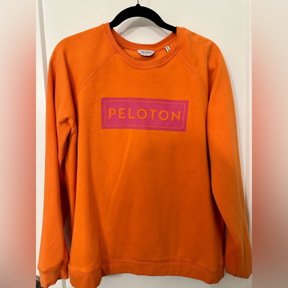 Peloton orange sweater size large